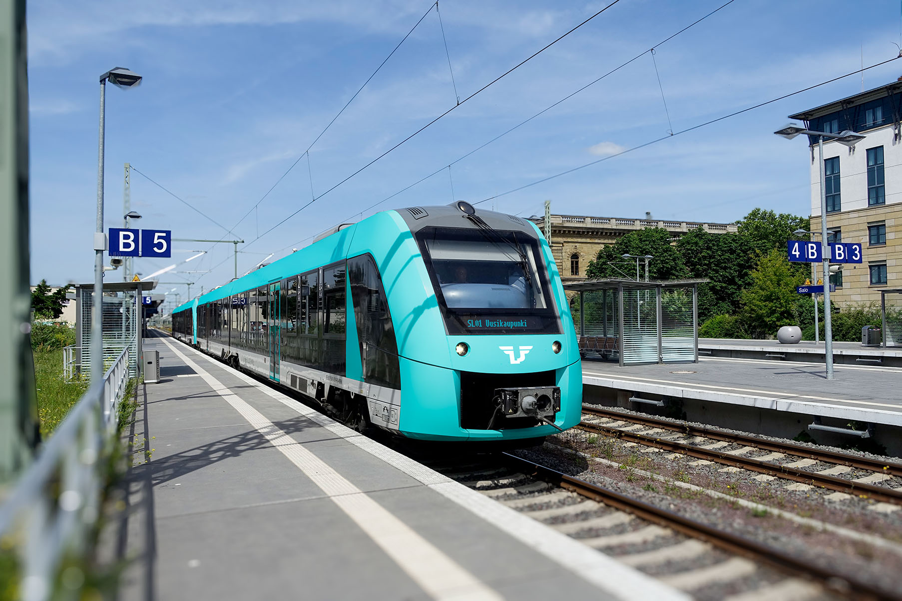 Concept image of a Suomen Lähijunat train at a station